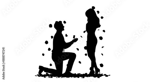 A heartfelt marriage proposal silhouette with a man kneeling amidst falling rose petals