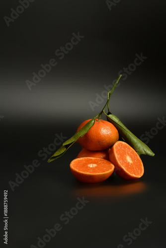 Close-up of halved oranges. Concept of fresh juice, vitamin burst, and healthy organic snacking.