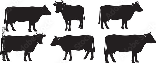 A group of cow silhouettes standing together in a line formation