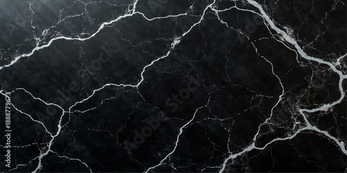 A powerful blue lightning bolt strikes the dark ground during a fierce night thunderstorm, flashing bright electric energy across the black sky amidst the danger of nature's stormy power