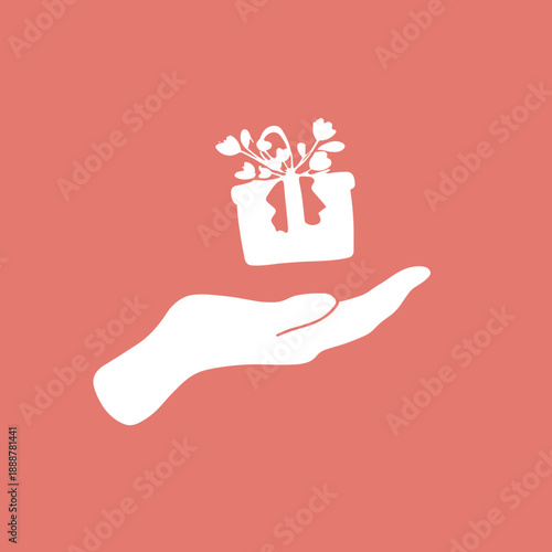 Minimal hand holding a gift box with hearts symbolizing love care and generosity on soft pink background