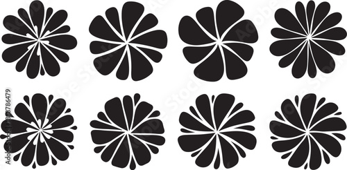 Set of eight black flower silhouettes on white background