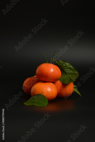 Minimalist aesthetic composition of citrus fruits. High-end food styling for restaurant menus and luxury branding.