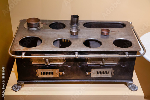 Antique toy stove on a white background. Items watches antiques technologies World tourism.