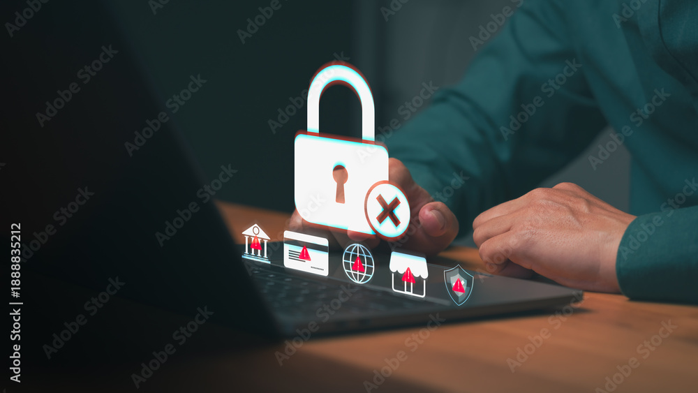 Fototapeta premium Man using laptop facing cyber security data breach. Internet safety, fraud, scam, and technology hacker issues. Business privacy protection and credit card account error.