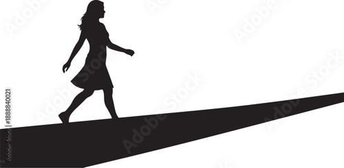 Silhouette of a woman walking on a steep slope