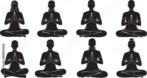 Silhouettes of people meditating in various yoga poses together