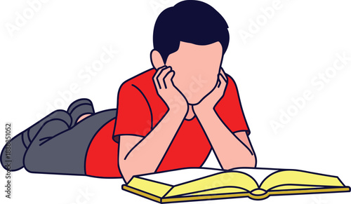 Boy relaxes on the floor while deeply engrossed in reading an open textbook under bright conditions.