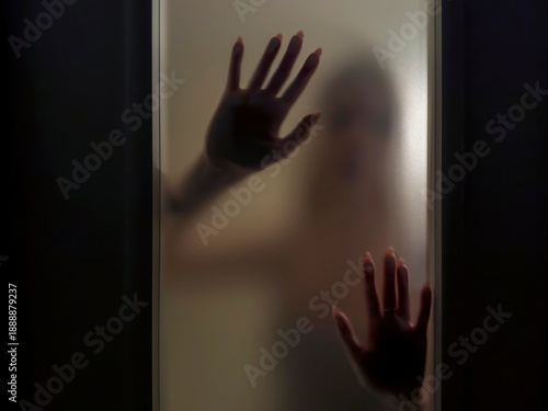 Girl behind frosted glass