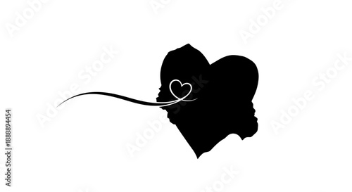 Silhouette of Couple Facing Heart Shape.