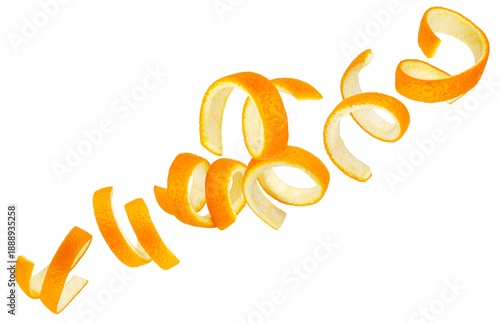 Foto Orange peels in the shape of curls fly through space, forming a chain