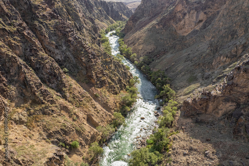 Wallpaper Mural A stormy stream of a mountain river flows inside the Black canyon located in Kazakhstan Torontodigital.ca