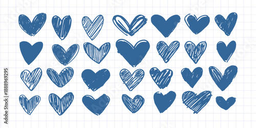 Hand drawn doodle hearts sketch collection on a blue squared notebook background. 