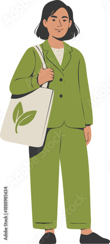 Smiling woman in green suit carrying an eco-friendly tote bag with leaf design.