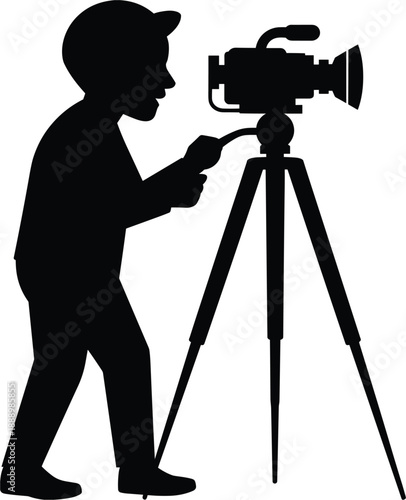 Silhouette of a person operating a camera on a tripod, capturing a moment in time with focus and precision