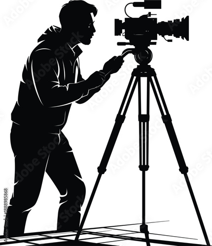 Silhouette of a videographer operating a camera mounted on a tripod, capturing a shot with focus and dedication