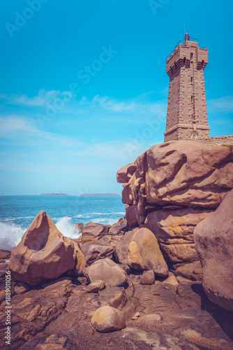Ploumanac'h Lighthouse On The Pink Granite Coast, Brittany, France. Ocean View On A Sunny Spring Day.
