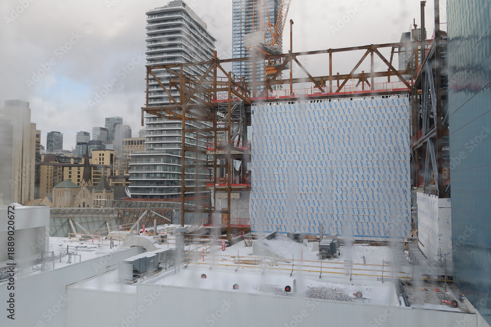 Fototapeta premium view through condensation at the Art Gallery of Ontario to the Dani Reiss Modern and Contemporary Gallery under construction on McCaul St, Toronto