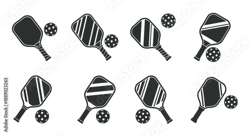 Pickleball equipment paddles and balls in various black and white designs