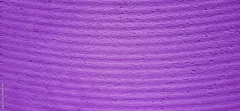 Fototapeta premium A vibrant purple surface, streaked with horizontal lines like silent pulses. This texture evokes both raw material and abstract elegance, perfect for artistic.