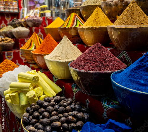 Colorful spices in bowls at the souq in Muscat, Oman