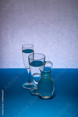 Tableau sur toile Glassware on a gray-blue background on the table