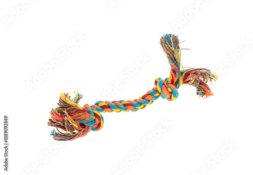coloured dog rope toy on white background