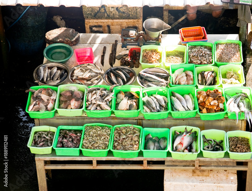 various types of fresh fish in boxes in traditional markets