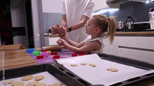 Wallpaper Mural Little child cutting gingerbread dough with star and triangle cookie cutters at home Torontodigital.ca