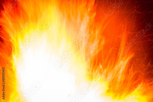 Vibrant fire and sparks burning with intense heat, providing an abstract background
