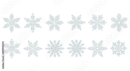 a collection of delicate light blue snowflakes arranged in a neat horizontal row on a white background
