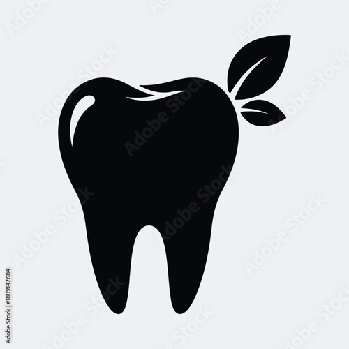 Clean healthy tooth with leaves representing natural dental care silhouette vector illustration