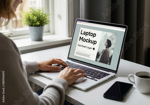 A woman using a laptop - mockup
