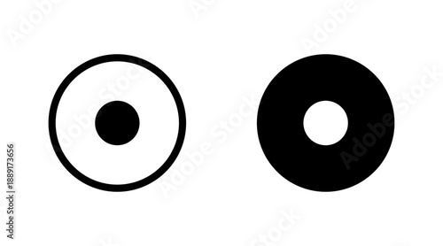 Contrasting minimalist circle designs showing positive and negative space on white background. media player control icon.
