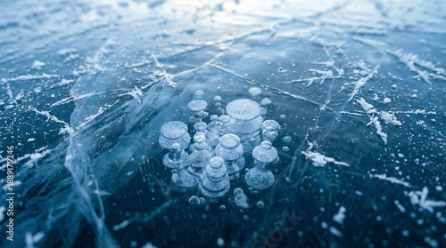 Macro Photography of Trapped Methane Air Bubbles Under Crystal Clear Blue Lake Ice