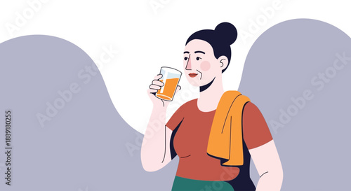 Woman enjoying a refreshing drink after a workout outdoors with a towel on her shoulder