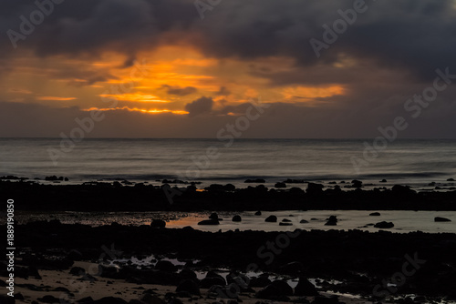 Water landscape with sunrise over Atlantic Ocean.