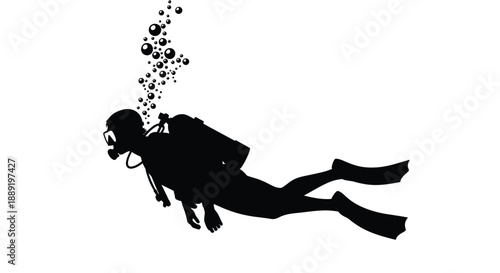 Silhouette of a scuba diver swimming with bubbles rising upwards