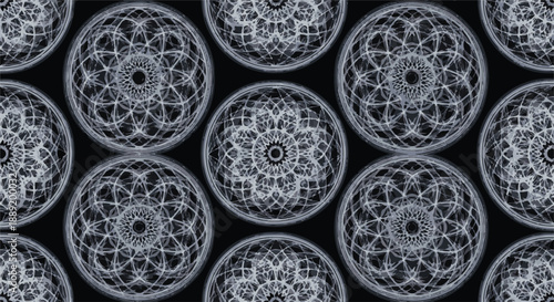 Intricate mandalas arranged in a seamless pattern on a dark background viewed from directly above