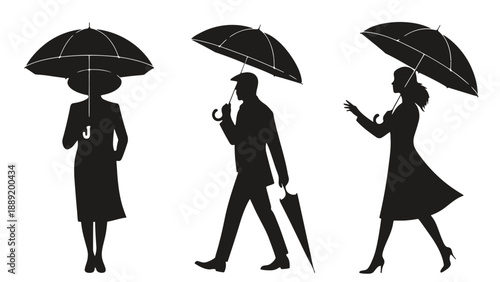 Silhouettes of people walking with umbrellas on a rainy day in the city