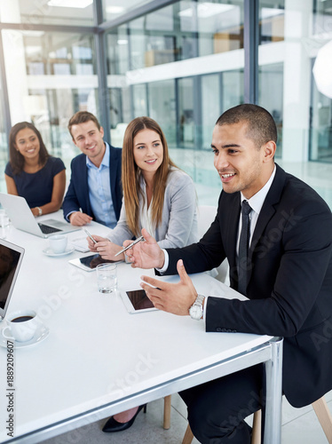 Young business people working in a conference room