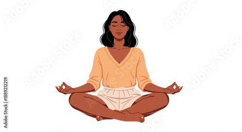 Woman meditating in lotus position with serene expression and relaxed posture