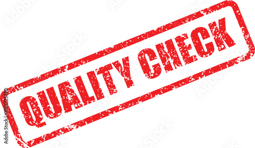 Red distressed rubber stamp with the letters QC VERIFIED diagonally placed on a white surface