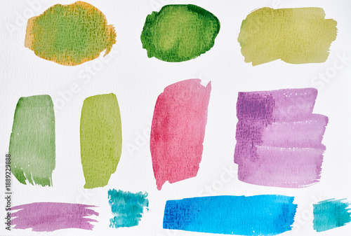 Fotografia Multi-colored watercolor brushstrokes and spots of various shapes are applied to