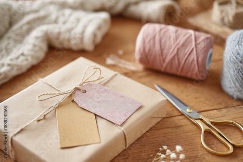 Valentines gift wrapping station: scissors, ribbons, tags, kraft paper, cozy craft aesthetic