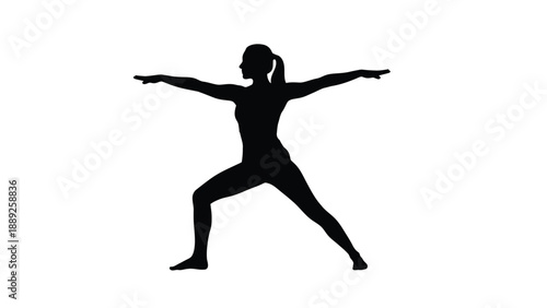 Silhouette of a woman demonstrating warrior two yoga pose with outstretched arms in profile view
