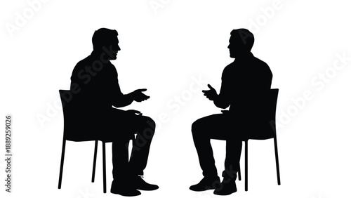 Silhouette of two men sitting in chairs engaged in a serious discussion or negotiation across from each other.