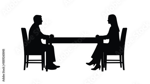 Silhouette of two professionals sitting opposite each other across a long rectangular conference table