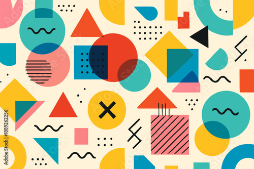 Colorful geometric shapes arranged in a playful pattern on a flat surface during daylight