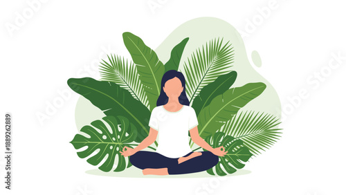 Serene woman sits in a lotus yoga pose to meditate in front of a background of large green tropical leaves for wellness.